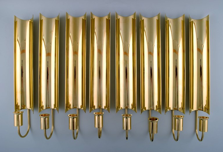 Eight Wall candlesticks, Reflex, Pierre Forsell, Skultuna, app. 1970s. Brass.