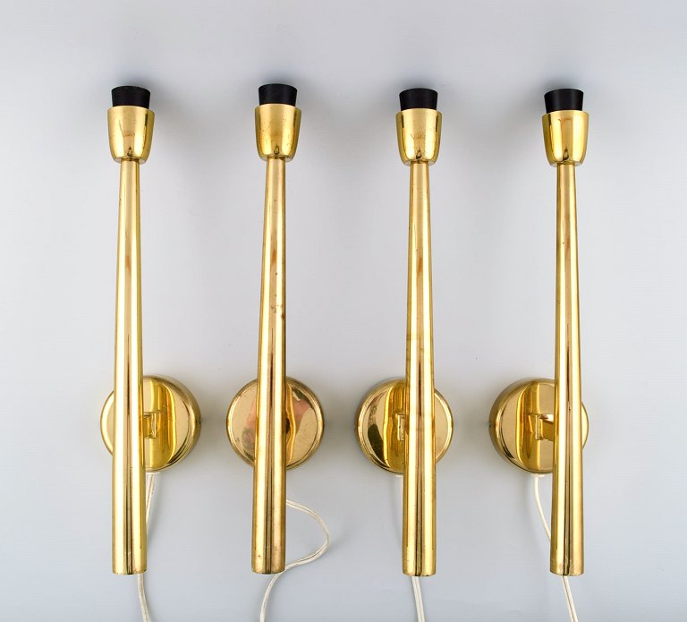 Josef Frank style. Four wall lamps in brass.
