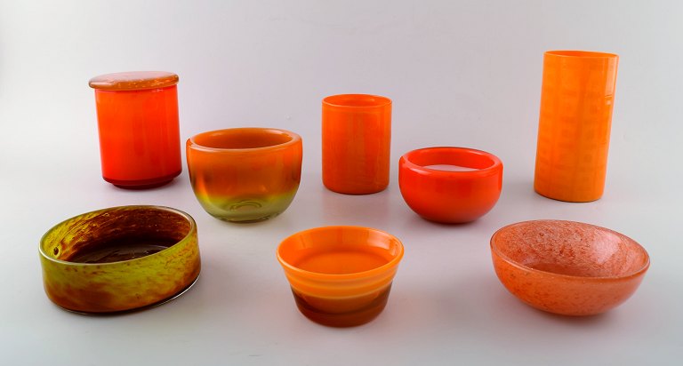 Collection of Scandinavian orange art glass vases and bowls, Holmegaard and 
more.