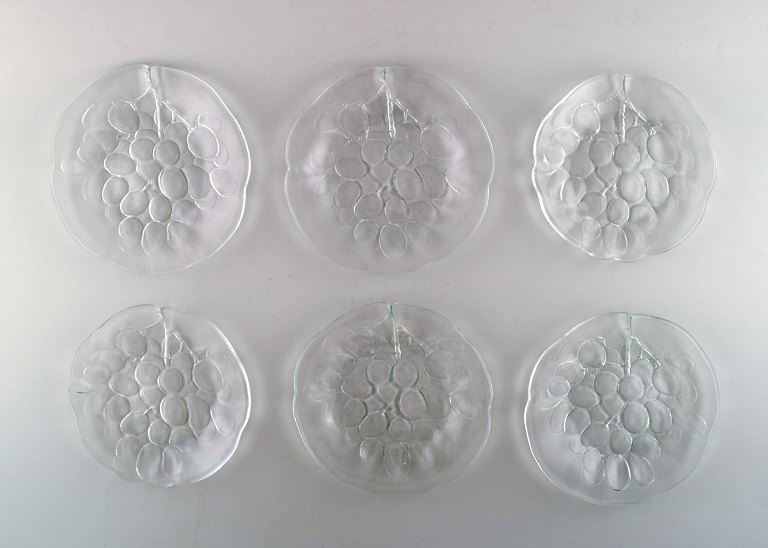 Scandinavian art glass. Six mouth blown glass dishes  adorned with grape 
bunches. 1960 s.
