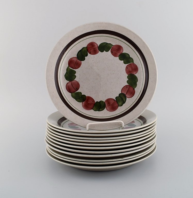 Jackie Lynd for Rörstrand. 12 Birgitta dinner plates in hand-painted glazed 
stoneware. 1970s.
