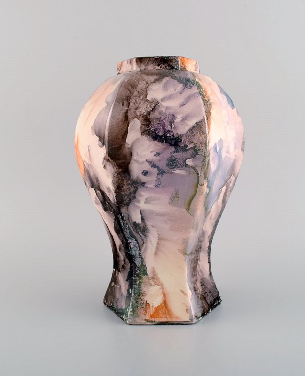 Early Rörstrand art deco vase in glazed ceramics. Beautiful glaze with 
multicolored marble effect. 1920s.

