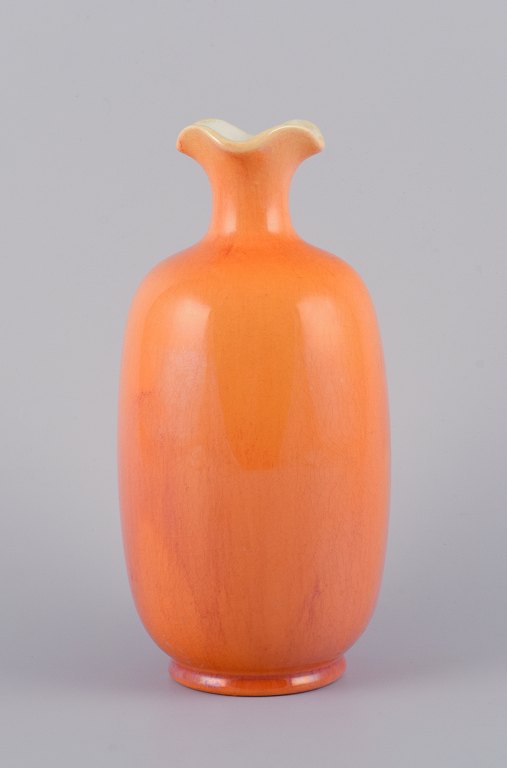 Rörstrand, Sweden, large faience vase with uranium yellow glaze.