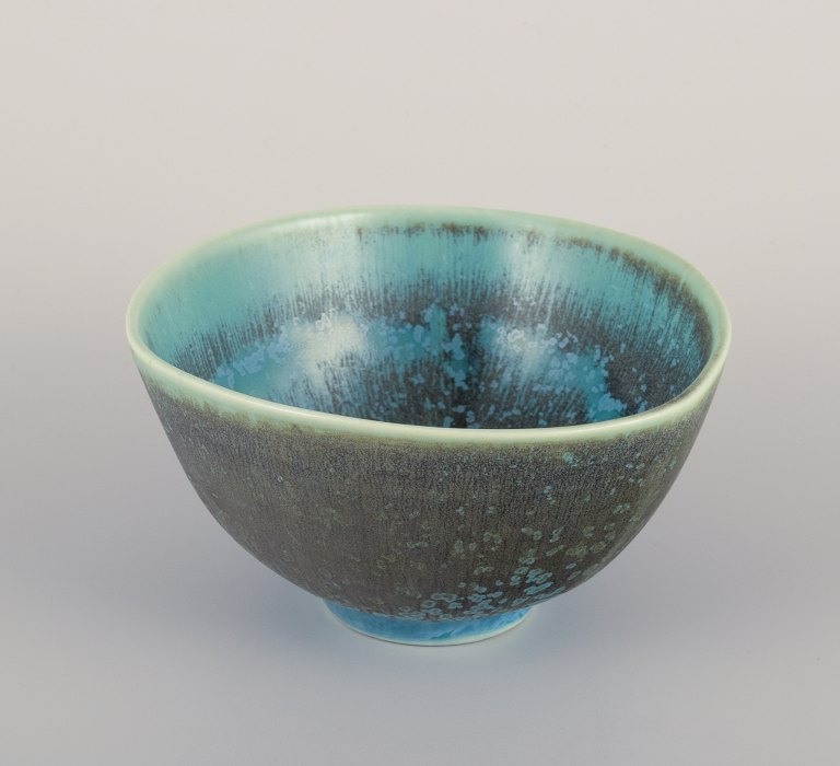 Berndt Friberg for Gustavsberg, Sweden. "Selecta" ceramic bowl in eggshell glaze 
with blue and green tones.