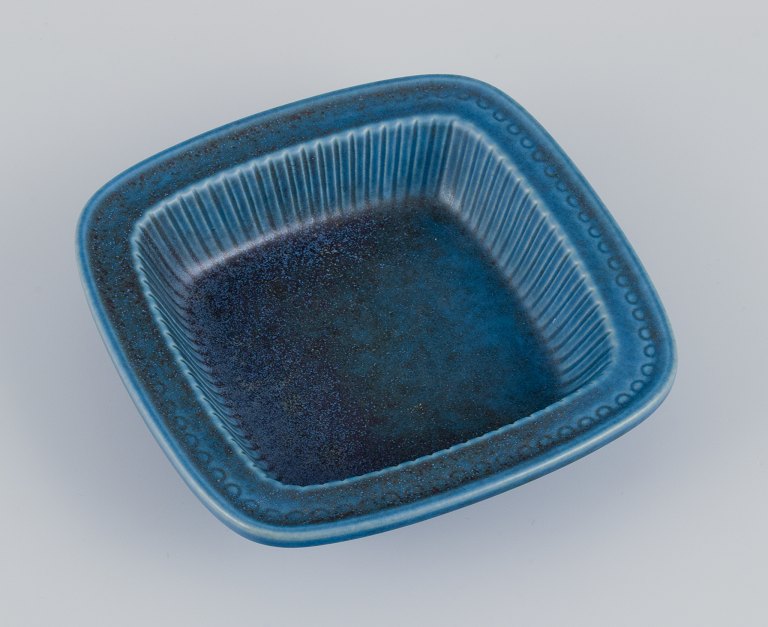 Gunnar Nylund (1904-1997) for Rörstrand, Sweden. Low bowl with blue-toned glaze 
from the "Collier" series.