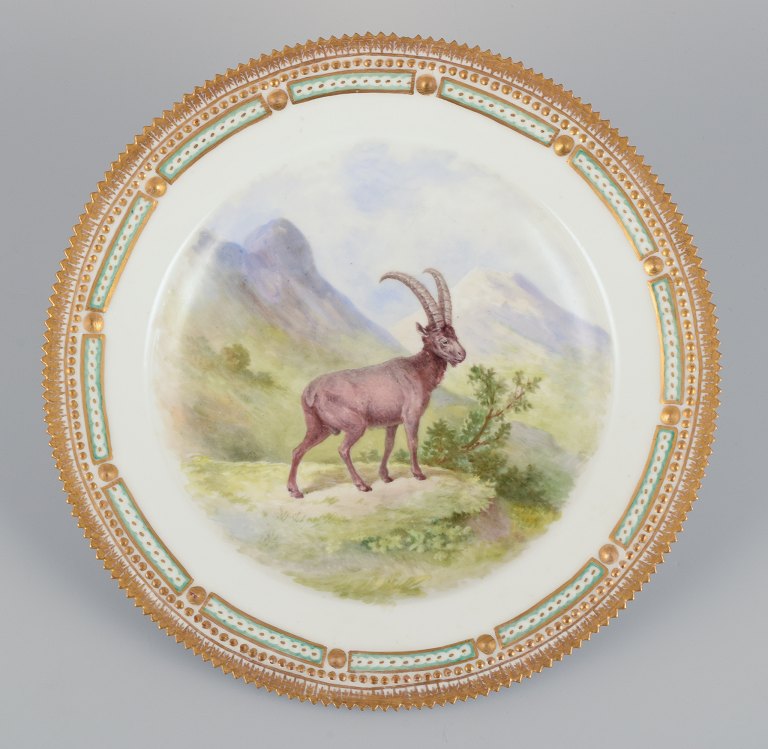 Royal Copenhagen Fauna Danica dinner plate with a motif of an ibex in a 
landscape. Hand-painted.