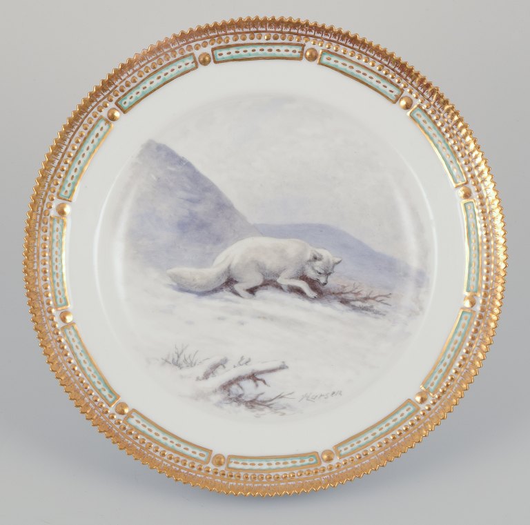 Royal Copenhagen Fauna Danica, hand-decorated dinner plate featuring a motif of 
an arctic fox.