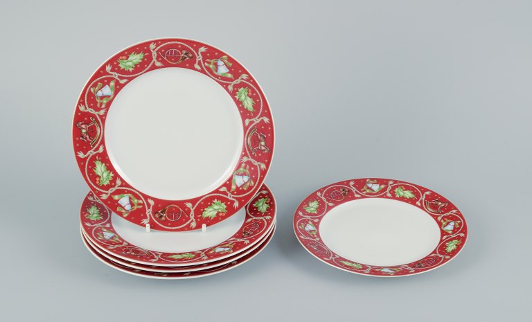 Rosenthal, Germany.
A set of five Christmas plates in porcelain decorated with Christmas motifs on 
burgundy with a gold-decorated edge.