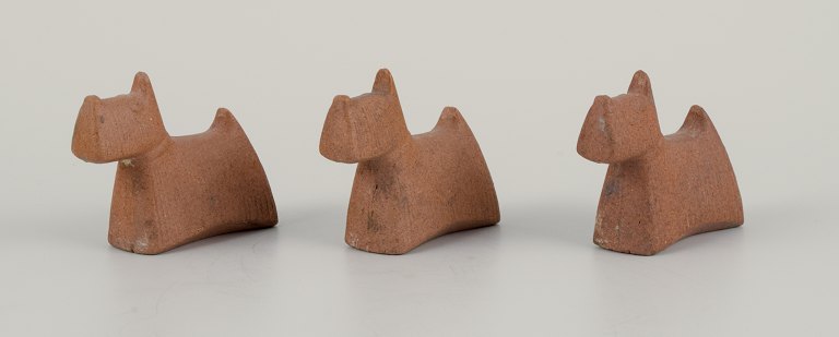 Stig Lindberg (1916-1982), three "Scottish" dogs in stoneware for Gustavsberg.