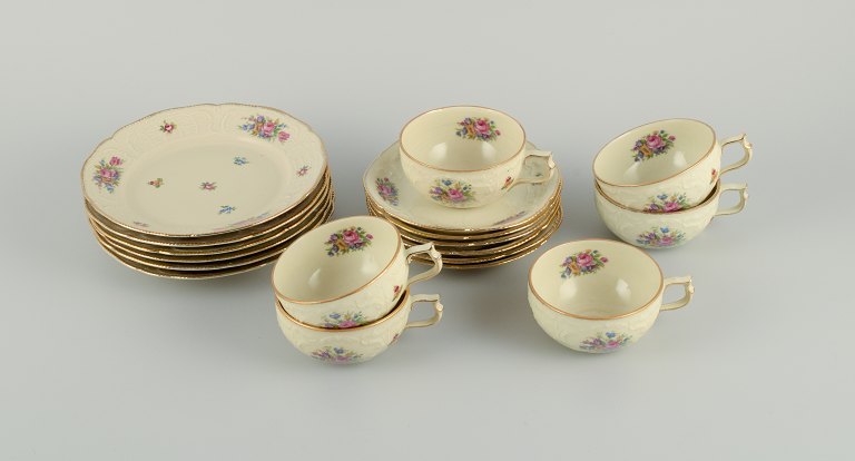 Rosenthal, Germany, "Sanssouci" Six coffee cups with matching saucers and cake 
plates decorated with flowers and gold.
