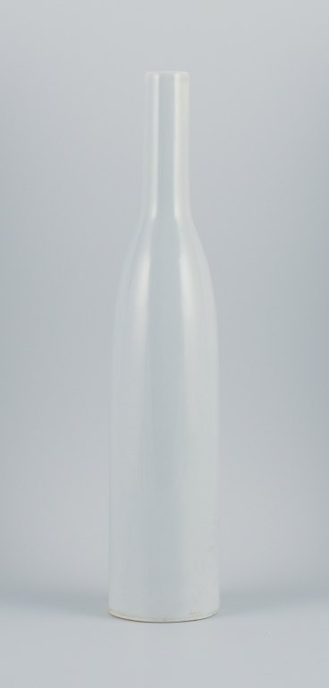 Style of Ruelland, tall bottle-shaped ceramic vase.
Light gray glaze. Handmade.