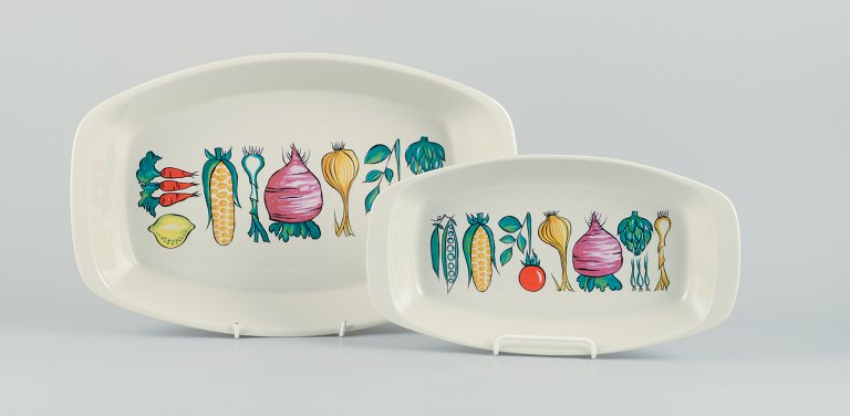 Villeroy & Boch, Luxembourg, two large "Primabella" platters in stoneware 
featuring various vegetable motifs.