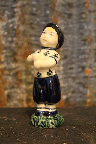 Little brother figure in earthenware Aluminia porcelain factory, Copenhagen - 
Denmark.