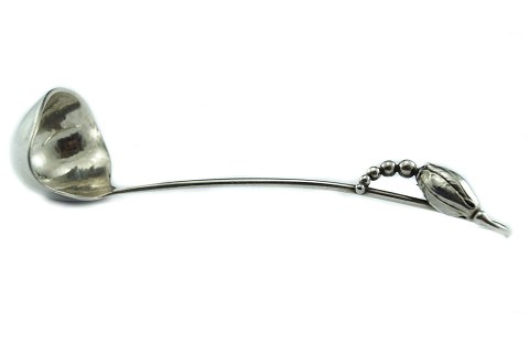 Georg Jensen; Magnolia/Blossom cream ladle of sterling silver