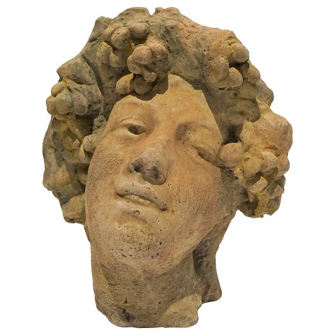 Fransk bygningsfragment i kunststen, "Bacchus"