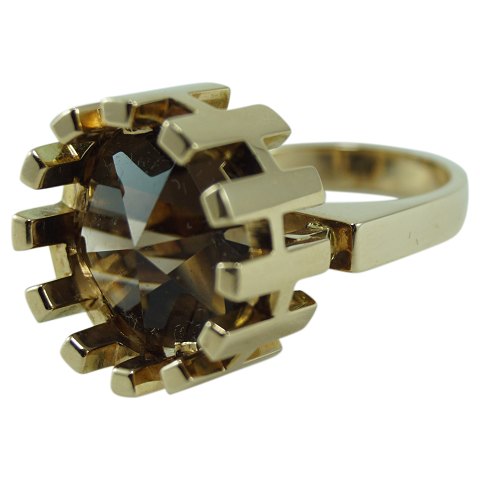 Hans Hansen; A ring of 14k gold set with a topaz