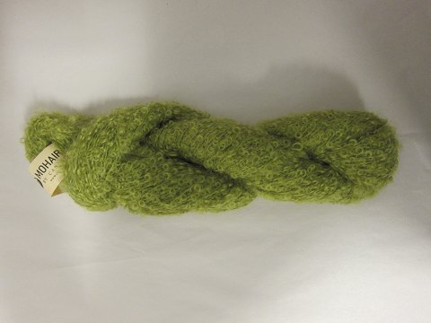 Mohair Bouclé
Mohair Bouclé ist ein Naturprodukt von der höchsten Qualität von den 
Angoraziegen aus Süd Afrika.
Diese Farbe ist: Limette, Farbenr. 1099
Knäuel mit 100 Gramm