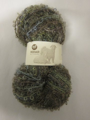 Mohair Bouclé Mix
Mohair Bouclé Mix is a natural product of a very high quality from the angora 
goat from South Africa.
The colour shown is: Forest mix, Colourno. 1008
1 ball of wool containing 100 grams