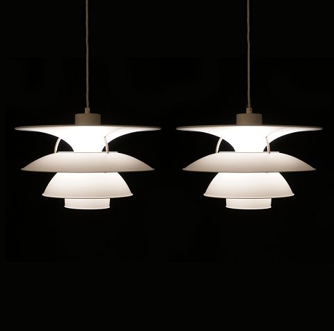 Poul Henningsen: A pair of Charlottenborg 
pendants. Designed 1979. D: 47cm