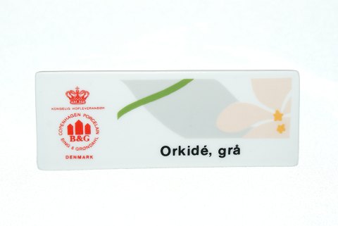 Forhandler skilt Orkide Grå
Fra Bing og Grøndahl
