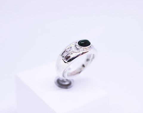 Ring of 925 sterling silver with small jade stone.
5000m2 showroom.