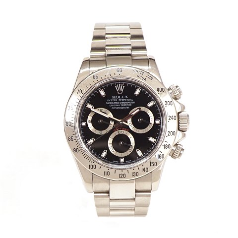 Rolex Daytona i stål. Ref. 116520. Solgt første 
gang 16.06.06. Leveres med box og papirer. Flot 
stand. D: 40mm