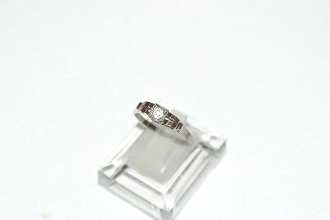 Elegant ring in white gold and red gold with zikon