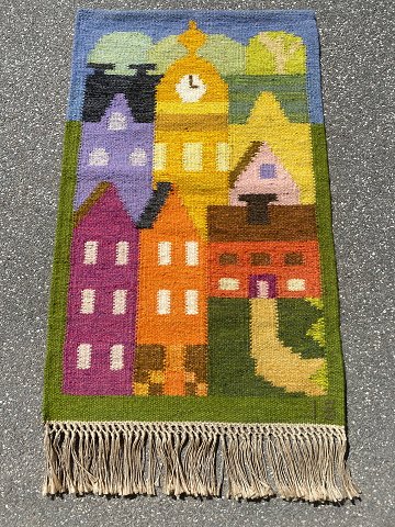 Swedish kelim tapestry by textile artist Ingegerd Silow. Cityscape with forest 
in the background. Mid 20th century