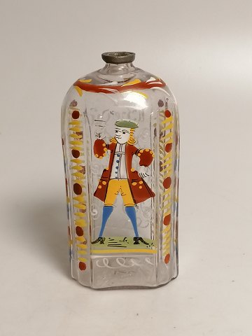 Enamel decorated brandy bottle