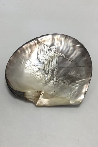 Large engraved mother of pearl shell.