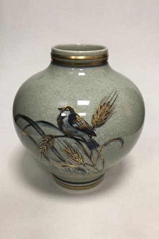 Royal Copenhagen Stoneware vase with crackle glaze, decorated with birds and 
wheat plants in green glaze, staffed with gold No 5062/3119