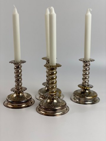 Twisted candlesticks, baroque shape, in silver-plated brass, first half of the 
20th century