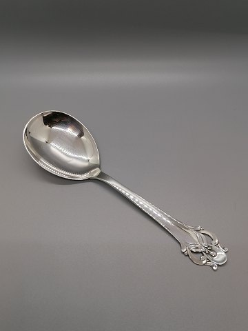 Serving spoon of three-tower silver