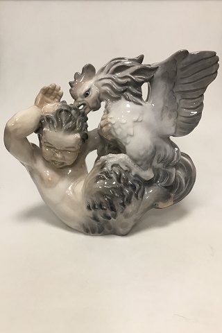 Royal Copenhagen Figurine og Faun in a fight with a Rooster No 3083