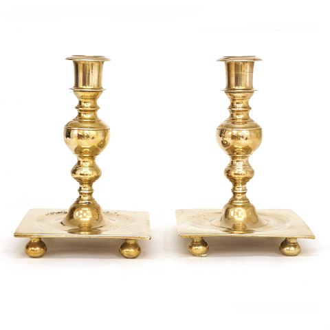 A pair of large brass "castle"-candlesticks. 
Denmark circa 1740. H: 23cm