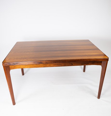 Dining table in rosewood with extensions designed by Henning Kjærnulf and 
manufactured by Vejle Furniture Factory in the 1960s. 
5000m2 showroom.