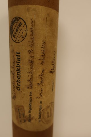 For the collector:
"GEDENKBLATT"
A tube/box made of cardboard/carton for posting a "Gedenkblatt" which is a page 
of Testimony
