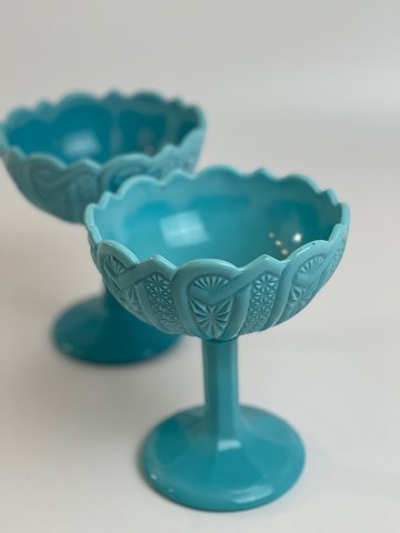 Beautiful, old, sky blue bowls on foot of milk glass, pressed glass