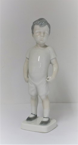 Bing & Grundahl. Porcelain figure. Early model of Kaj. This one is white. Model 
1617. Height 19.5 cm. (1 quality)