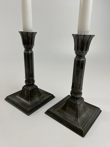 Pair of Just Andersen candlesticks in disco metal. Lots of patina