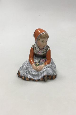 Royal Copenhagen overglaze regional figurine of girl with flowers "Fyn" = 
"Funen" No 12420