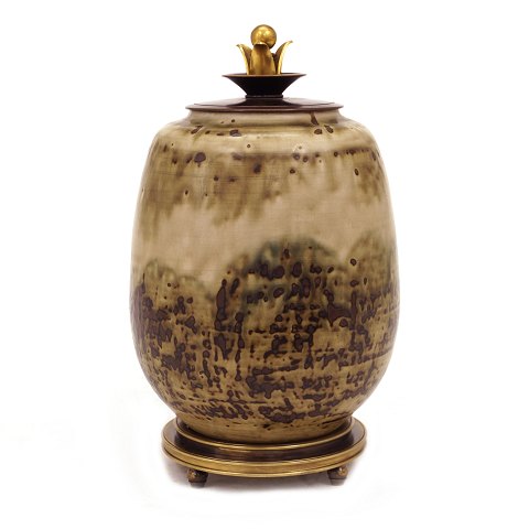 A Danish stoneware lidded jar by Carl Halier, 
1873-1948, for Royal Copenhagen. Signed 1944. H: 
26cm