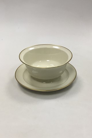 Royal Copenhagen Plain Creme pattern Round Sauceboat with gold rim No 9580