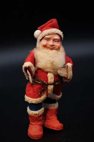 Old Santa Claus in sleeves and felt clothes. 
Height:14cm.