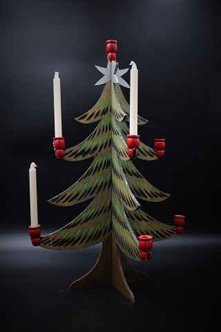 Old "Christmas tree candlestick" from the 50s in painted carved wood with room 
for 9 small Christmas candles.  
H:44.5cm. Dia.:30cm.