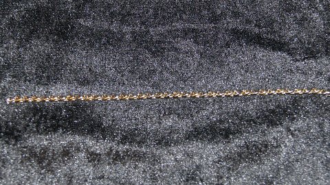 Elegant Armbånd 14 karat rød og hvidguld
Stemplet  585
Længde 19 cm