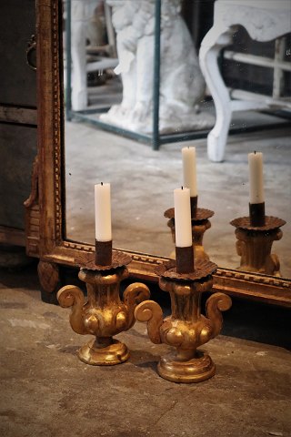A pair of old 1800 century French gilded wooden candlesticks with candle holder 
in metal and with a really nice patina...