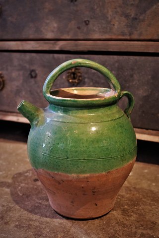 Old 1800s pottery jars with pouring spouts from the South of France 
in green glaze…