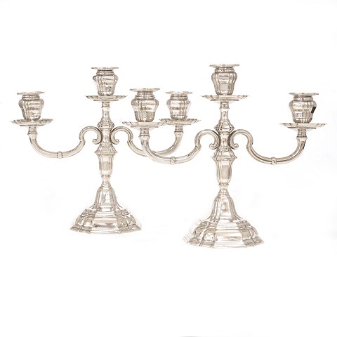 Pair of silver candelabra by K. C. Hermann, 
Copenhagen 1944. H: 27cm. W: 31cm. W. 1.253gr