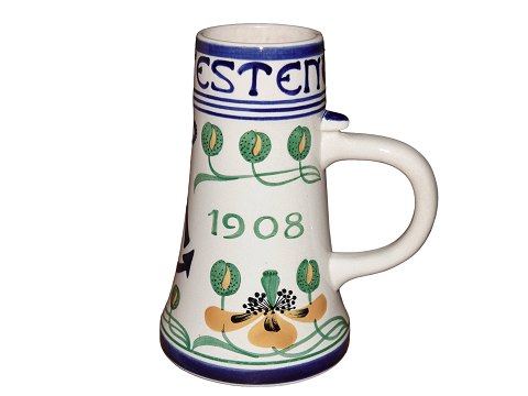 Aluminia 
Large mug Valmuefesten 1908 with yellow decoration